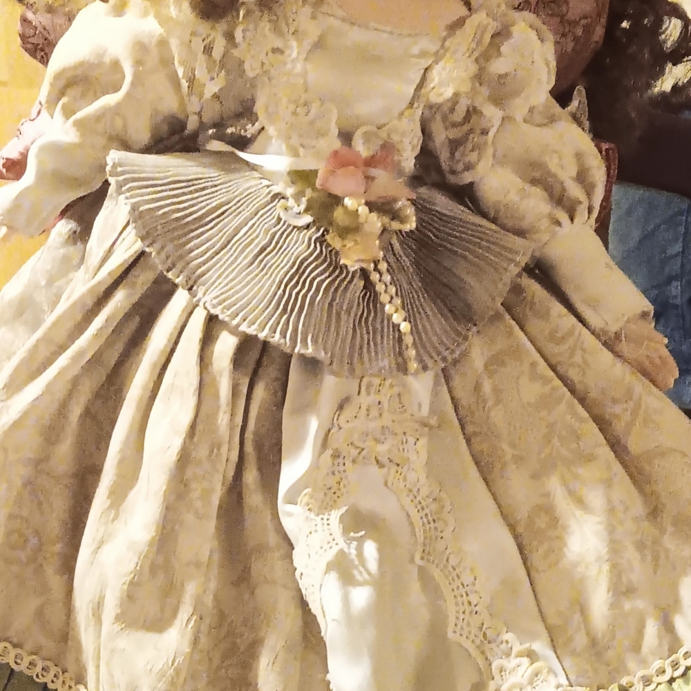 Elegant Cream and Gold Doll